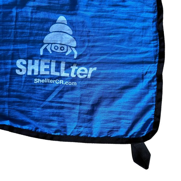 Logo Shellter en el BLANKET