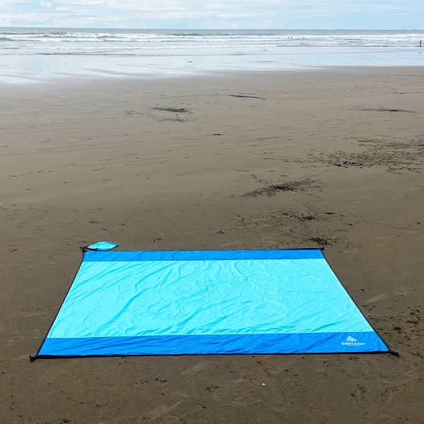 BLANKET en la playa