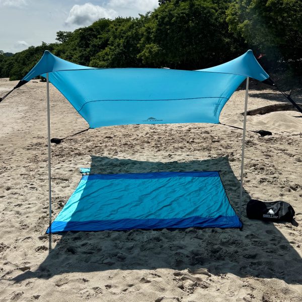 BLANKET y TENT en la playa